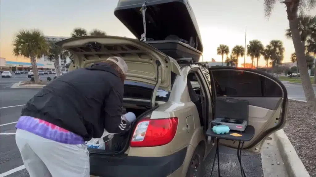 guy lives in car camper tiny home