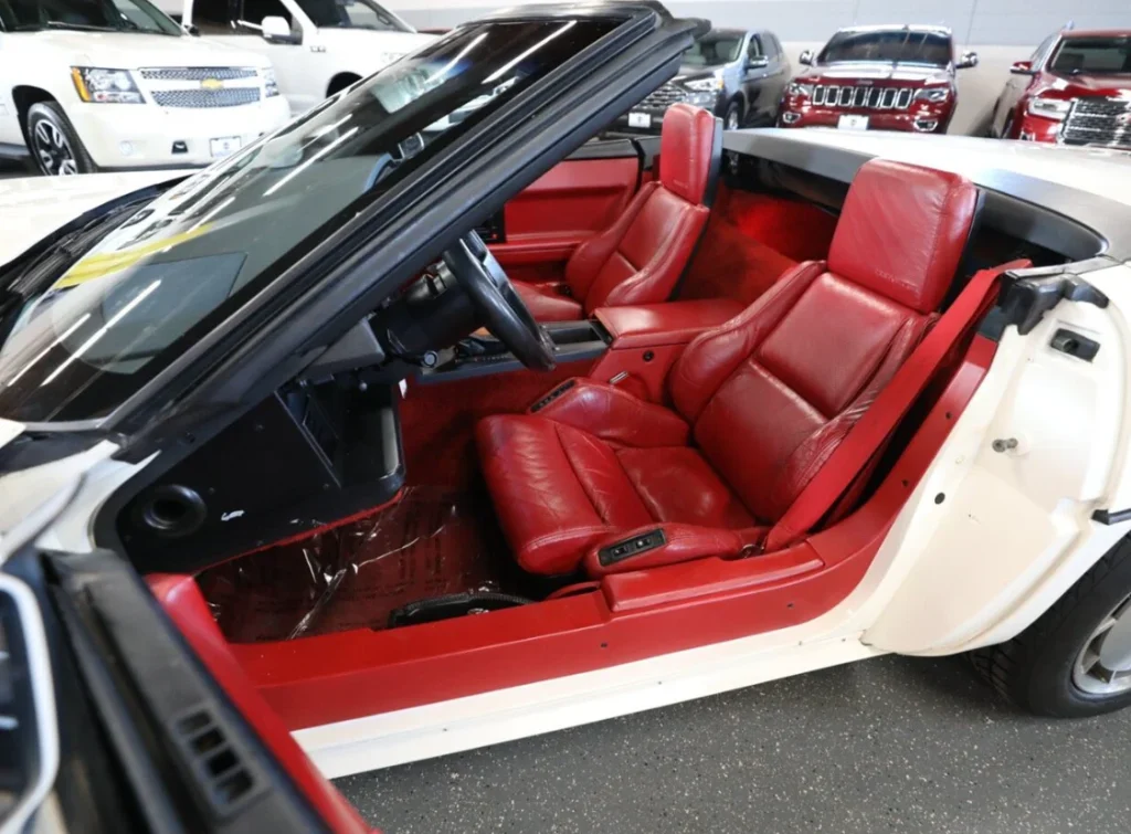 This stunning 1986 Indy 500 Pace Car edition Corvette convertible is finished in pristine white over a red interior and has just 16,000 miles on the clock