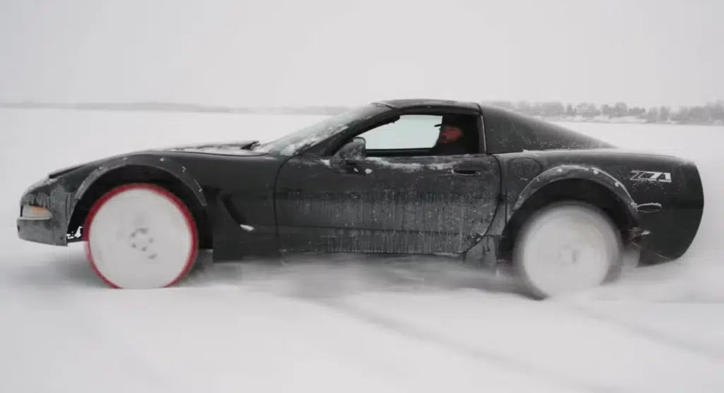 Man in Minnesota on a frozen lake is just doing some testing... testing a Corvette on saw blades