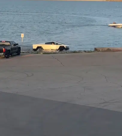 Tesla Cybertruck was seen driving through a Texas lake and those watching were blown away