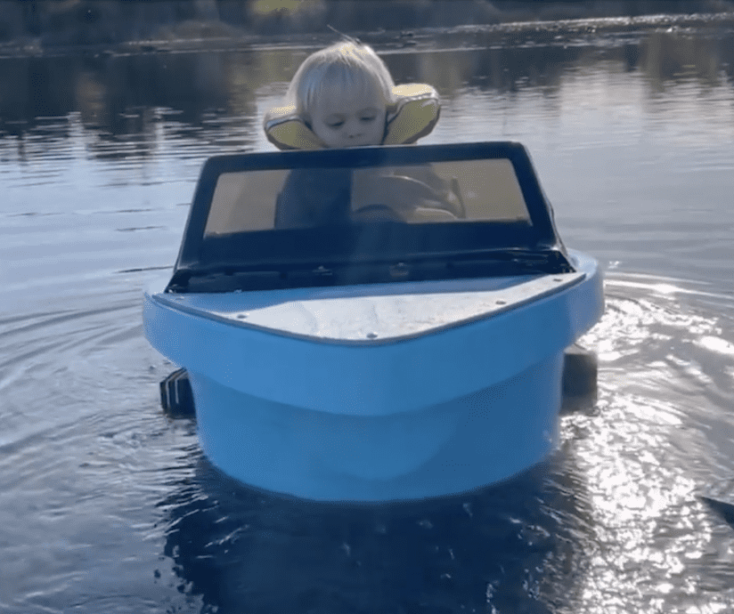 toddler driving and sailing