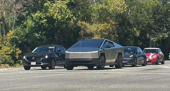 Cybertruck next to Model 3, Mazda and Mini Cooper