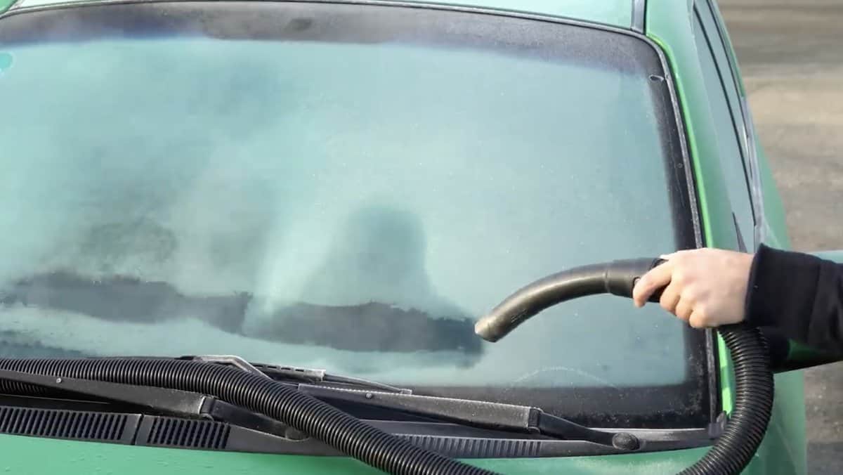 Defrosting a windshield with exhaust heat