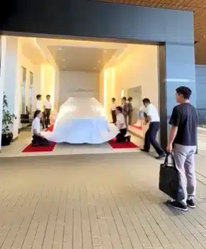 When you buy a Lexus in Japan, the delivery day plays out like a movie scene - bows, music, and a dramatic car reveal that feels more ritual than sale