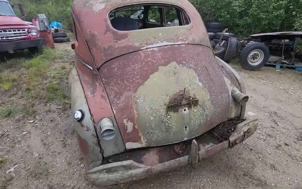 A 1941 Plymouth Deluxe that was found rotting away in a junkyard had a secret military past