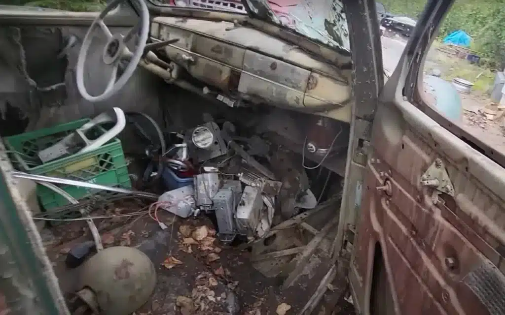 A 1941 Plymouth Deluxe that was found rotting away in a junkyard had a secret military past