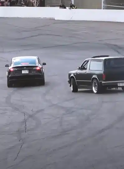 Chevrolet Blazer stuns Tesla in a wild one-lap spectator drag at Seekonk Speedway, turning a clean start into a chaotic, crowd-roaring finish