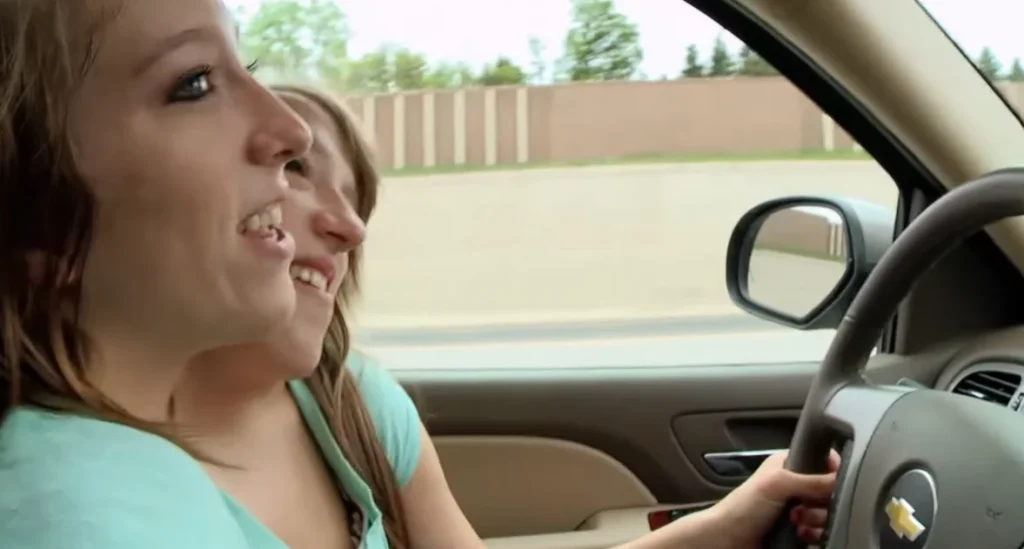 Minnesota conjoined twins Abby and Brittany Hensel explain how they drive a car