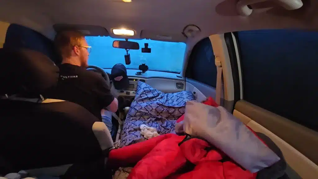 guy lives in car camper tiny home