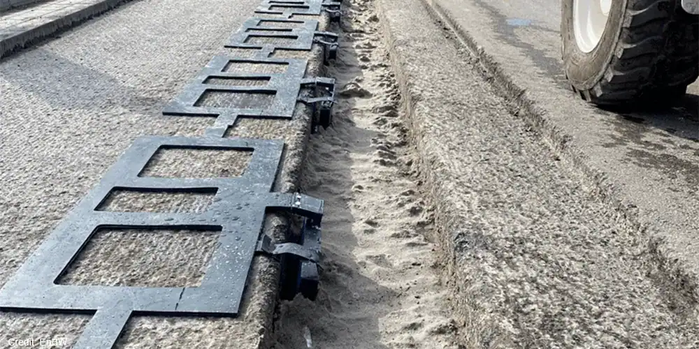 France just activated the world's first highway that charges electric cars and trucks while they're driving