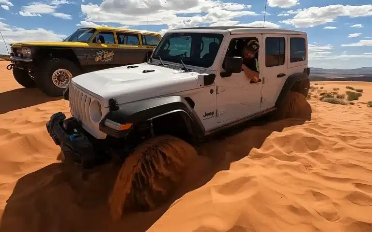 electric Jeep Wrangler stuck in Utah sand dunes