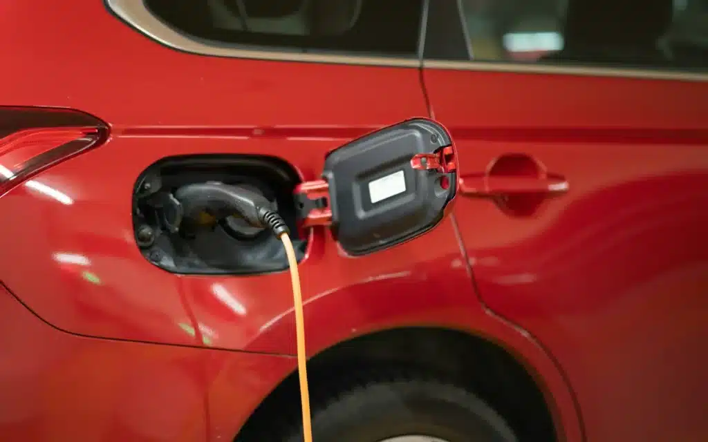 Parking your gas car in a parking space designated for EVs can be illegal and can even land you with a hefty fine in some states