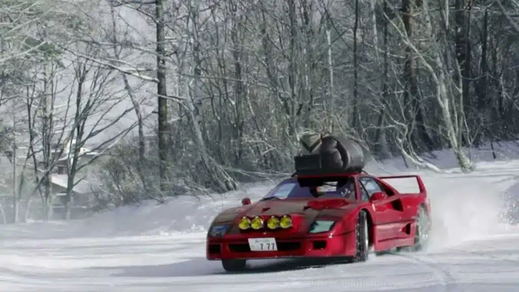 Ferrari F40 supercar drifting off-road at snowy Japan Ryuoo Ski Park