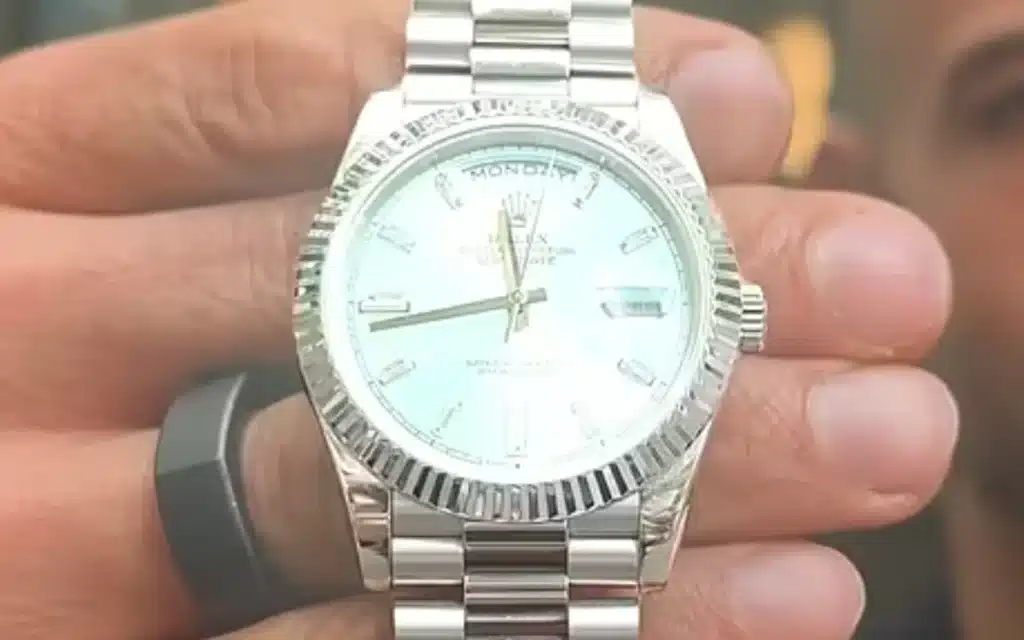 YouTuber Sabri Suby takes a fake Rolex into an official boutique to see if staff will spot it, and the salesman’s reaction says everything
