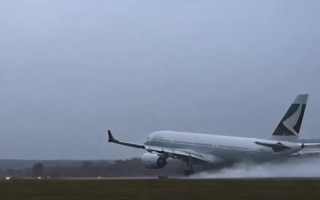 Airbus A330 looks suspended in place on takeoff in physics-defying footage due to unique stormy conditions