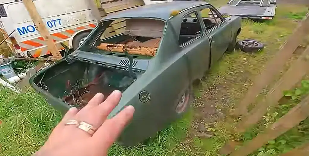 Urban explorer uncovers ultra-rare Ford Escort in a car graveyard filled with abandoned vehicles