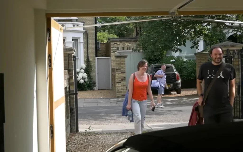 A YouTuber opens his garage to reveal a Lamborghini Huracán Performante and Ferrari 458 Speciale Aperta, sparking priceless reactions from passersby