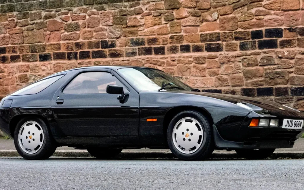 A Porsche 928 S bought for spare parts previously owned by George Harrison triggered a $125,000 restoration and a six-figure auction sale