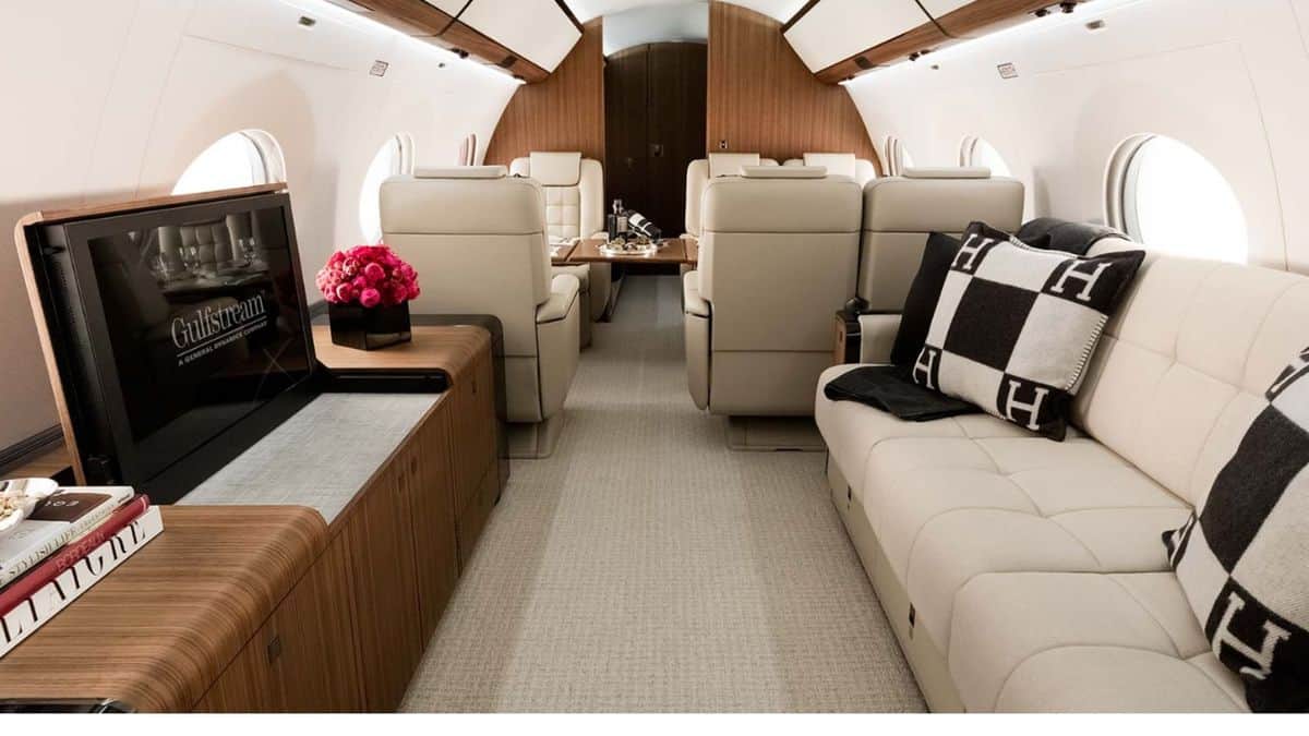 A TV and couch seen inside the G650.