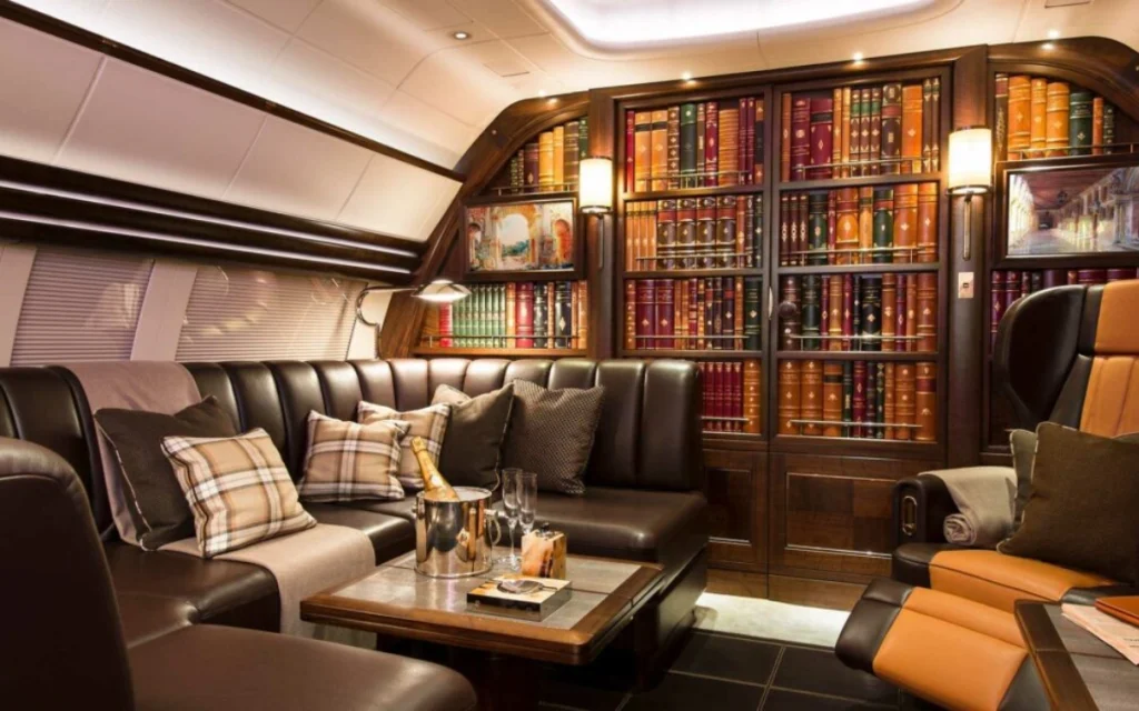 This Airbus ACJ319 has a hidden bookshelf door, designed by Winch Design