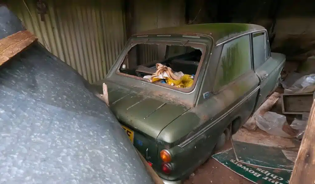 Abandoned farm in the middle of the UK found to be hiding loads of classic cars including Hillman Imp parked there for decades