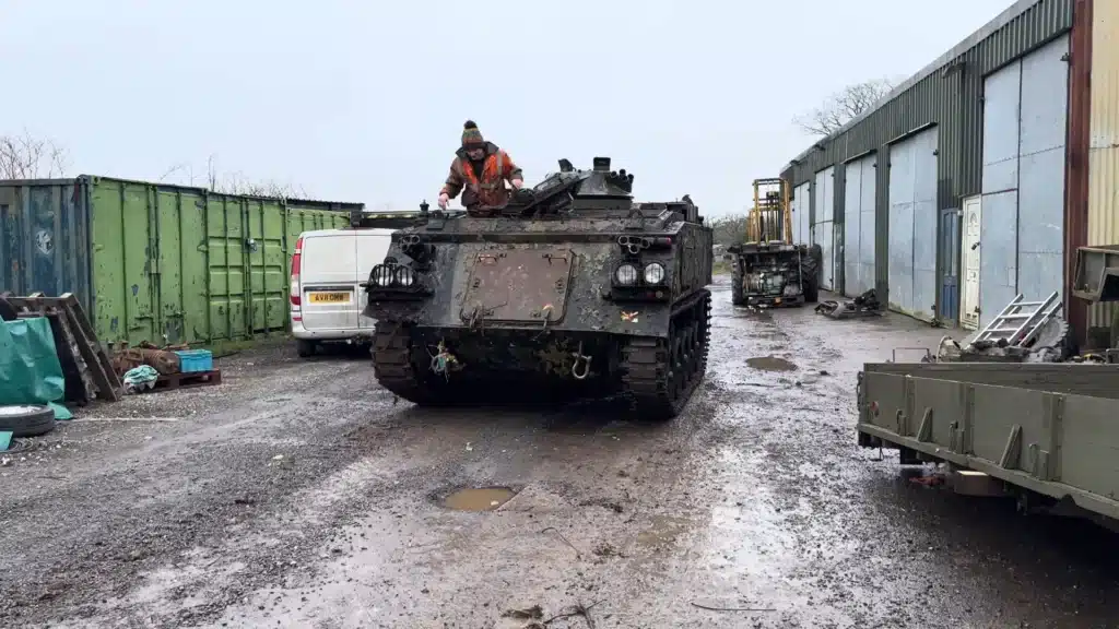 man rescues abandoned tank and starts it