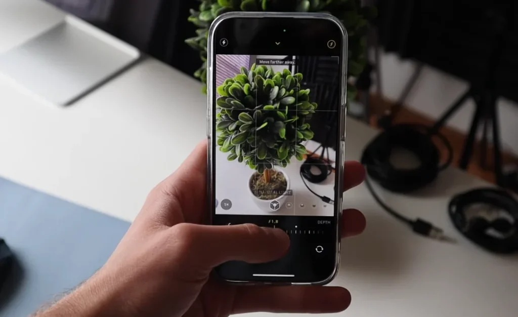 This is what the black dot on your iPhone camera is and what it actually does