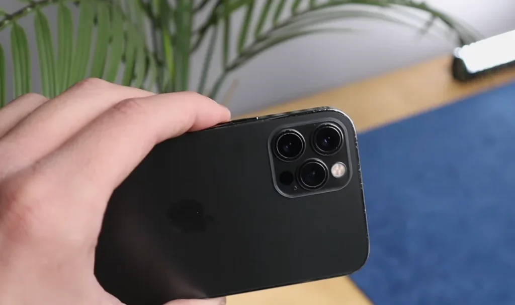 This is what the black dot on your iPhone camera is and what it actually does