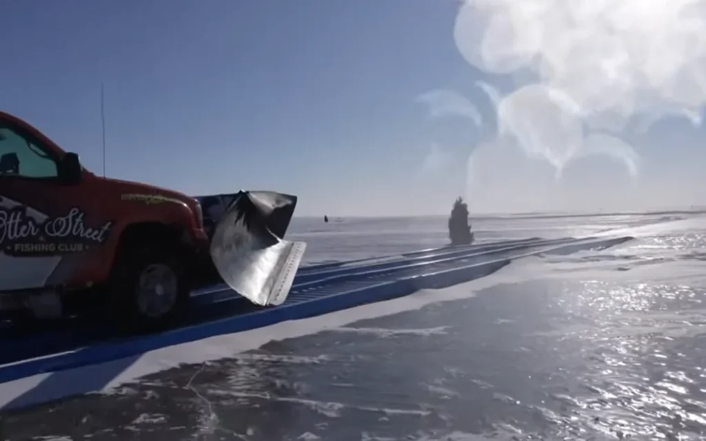A team of volunteers has cut travel around Lake Winnebago by creating an ice highway right across the lake - turning an hour-long journey into a 20-minute one