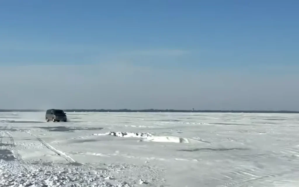 A team of volunteers has cut travel around Lake Winnebago by creating an ice highway right across the lake - turning an hour-long journey into a 20-minute one