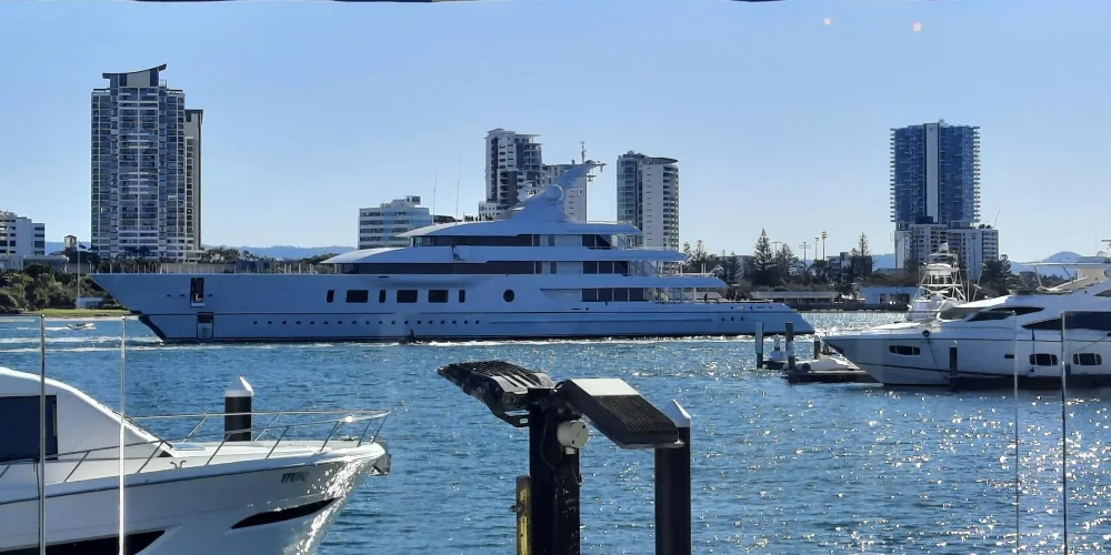 Onlookers in Australia blown away when mystery billionaire pulls up in superyacht with a whole police escort