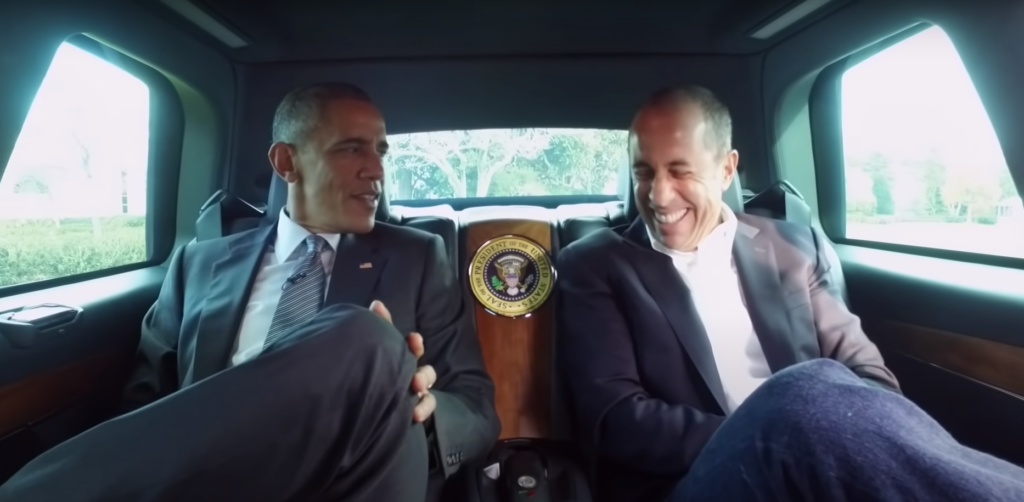 Barack Obama and Jerry Seinfeld in the back of The Beast.