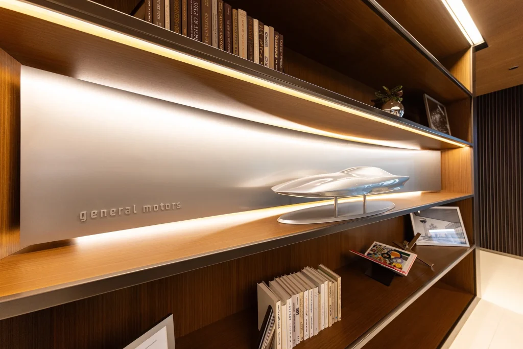 General Motors has opened a new headquarters inside a former downtown Detroit department store, blending design history, public space, and brand storytelling