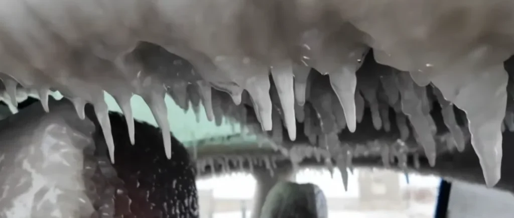 Abandoned BMW turns into a tourist destination after being battered by ice and wind for days