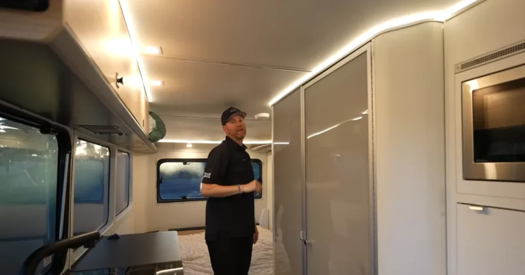 Man who was first person in the world to sleep in a Cybertruck takes the Tesla camping with an electric RV to see which is better