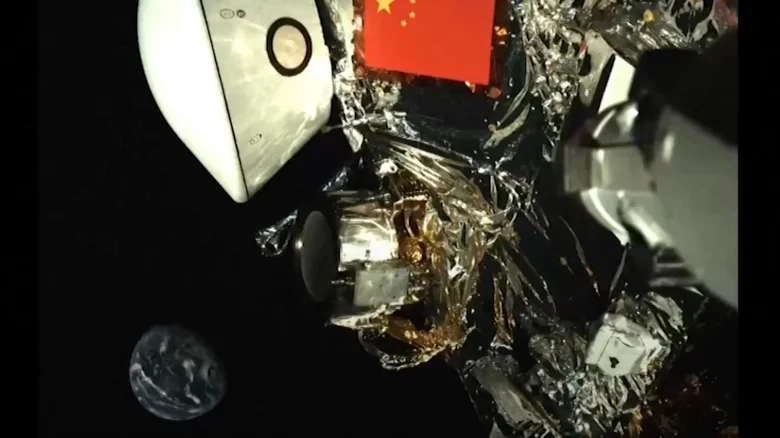 China's space probe which is halfway to asteroid grabs stunning selfie as Earth glows tiny in the background