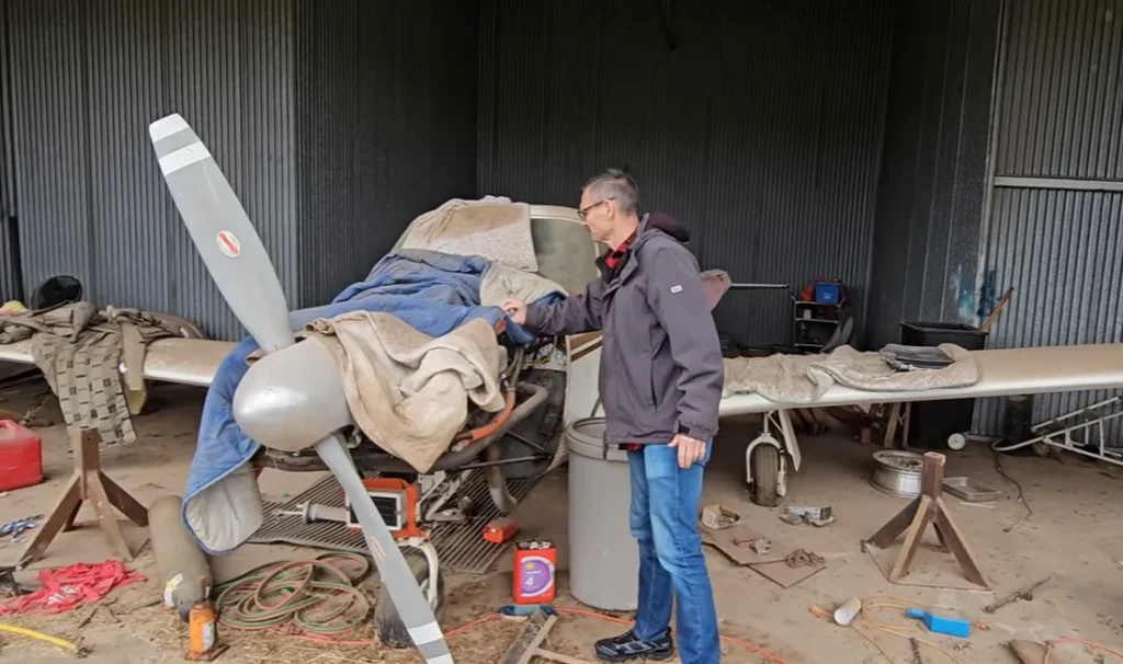 A Florida YouTuber opened a hangar untouched for decades and finds a Comanche abandoned airplane, then decides to see if it still has life left in it