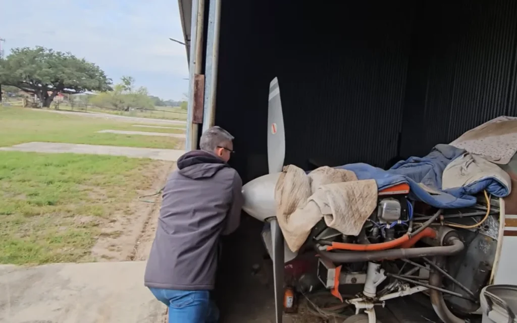 A Florida YouTuber opened a hangar untouched for decades and finds a Comanche abandoned airplane, then decides to see if it still has life left in it