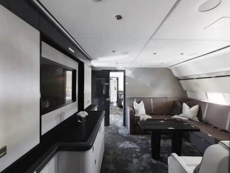 The lounge aboard the private jet