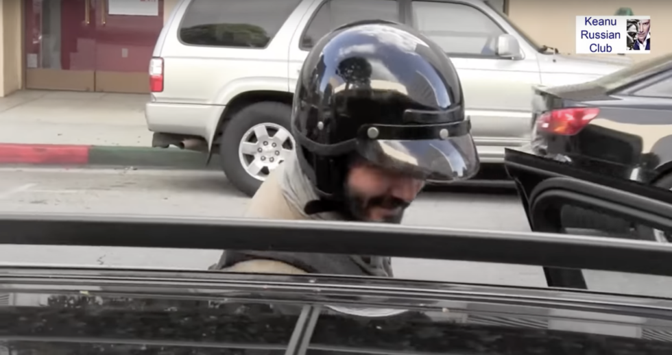 Keanu Reeves chilled despite woman backing into his bike