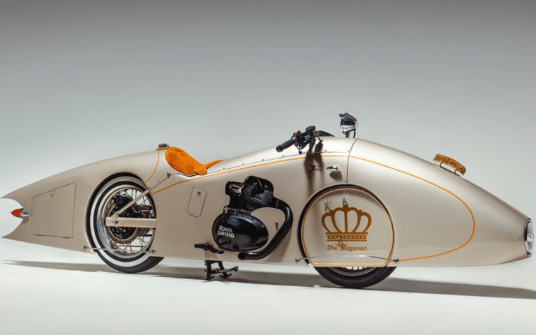 Check out this custom Royal Enfield Shotgun 650 that’s been converted into an art deco streamliner, complete with a secret storage compartment stocked with gin