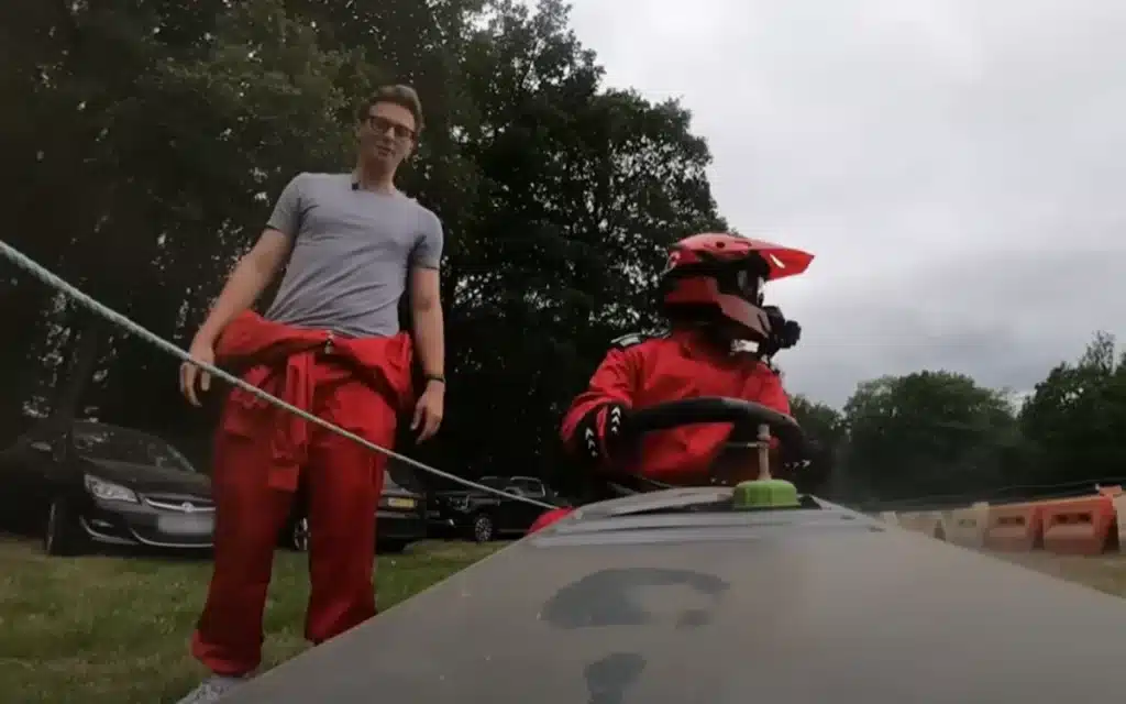 YouTuber Max Fosh sneaks F1 driver Jack Aitken into a lawnmower race, only for locals to outdrive him and claim bragging rights