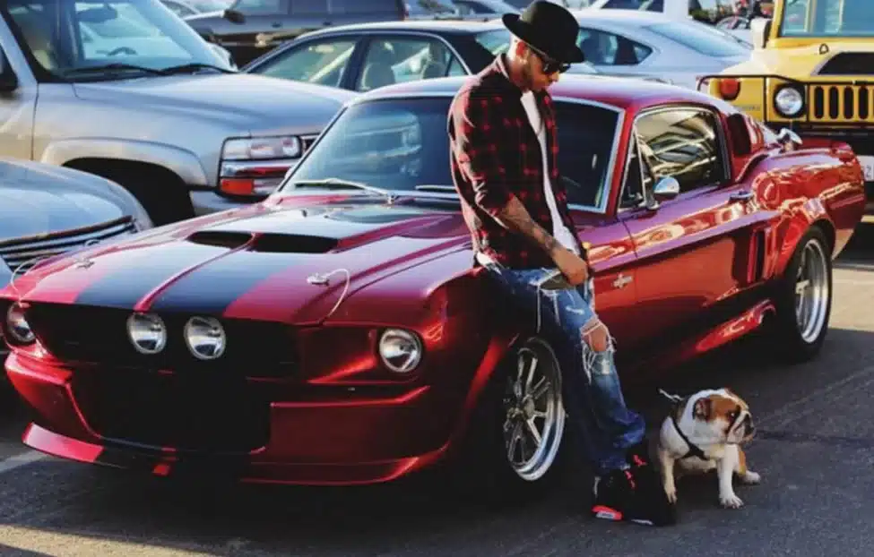 Lewis Hamilton with his red Ford Shelby