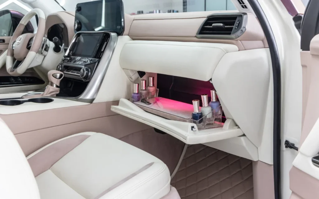 The Lexus Glam LX concept vehicle is a fashionista’s dream, complete with its own dressing room, trunk vanity, and manicure station