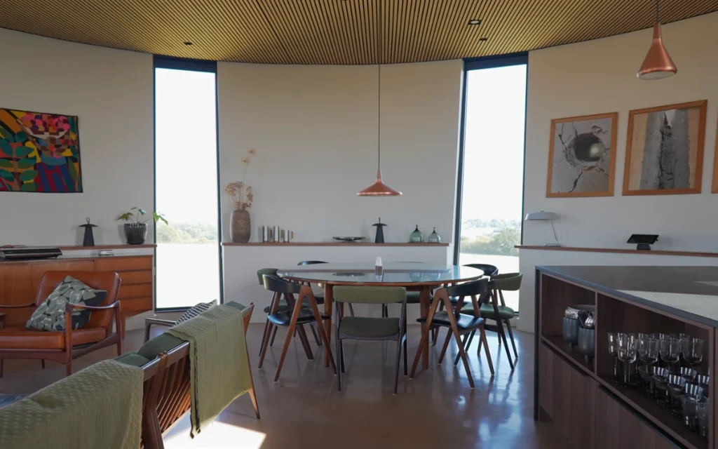 It takes a bold industrial designer to look past rust and concrete and turn a towering water tower into a truly quirky home.