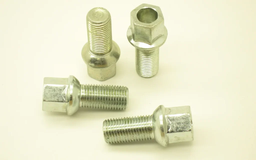 More automakers are ditching lug nuts for lug bolts - here’s what that means, and why it’s great for factories but a nightmare for flat tires