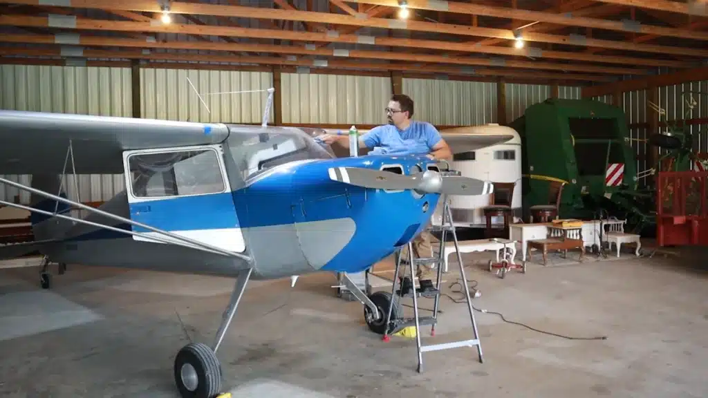 man restoring Cessna 140 vintage airplane surprised by costs