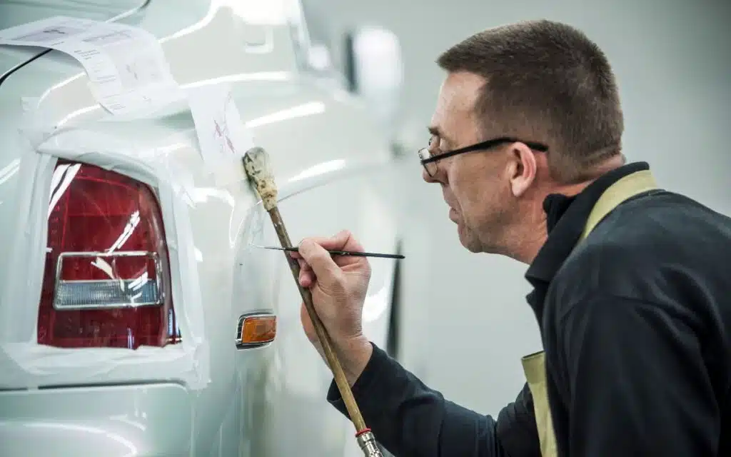 Man is the only person allowed to paint lines on Rolls-Royce