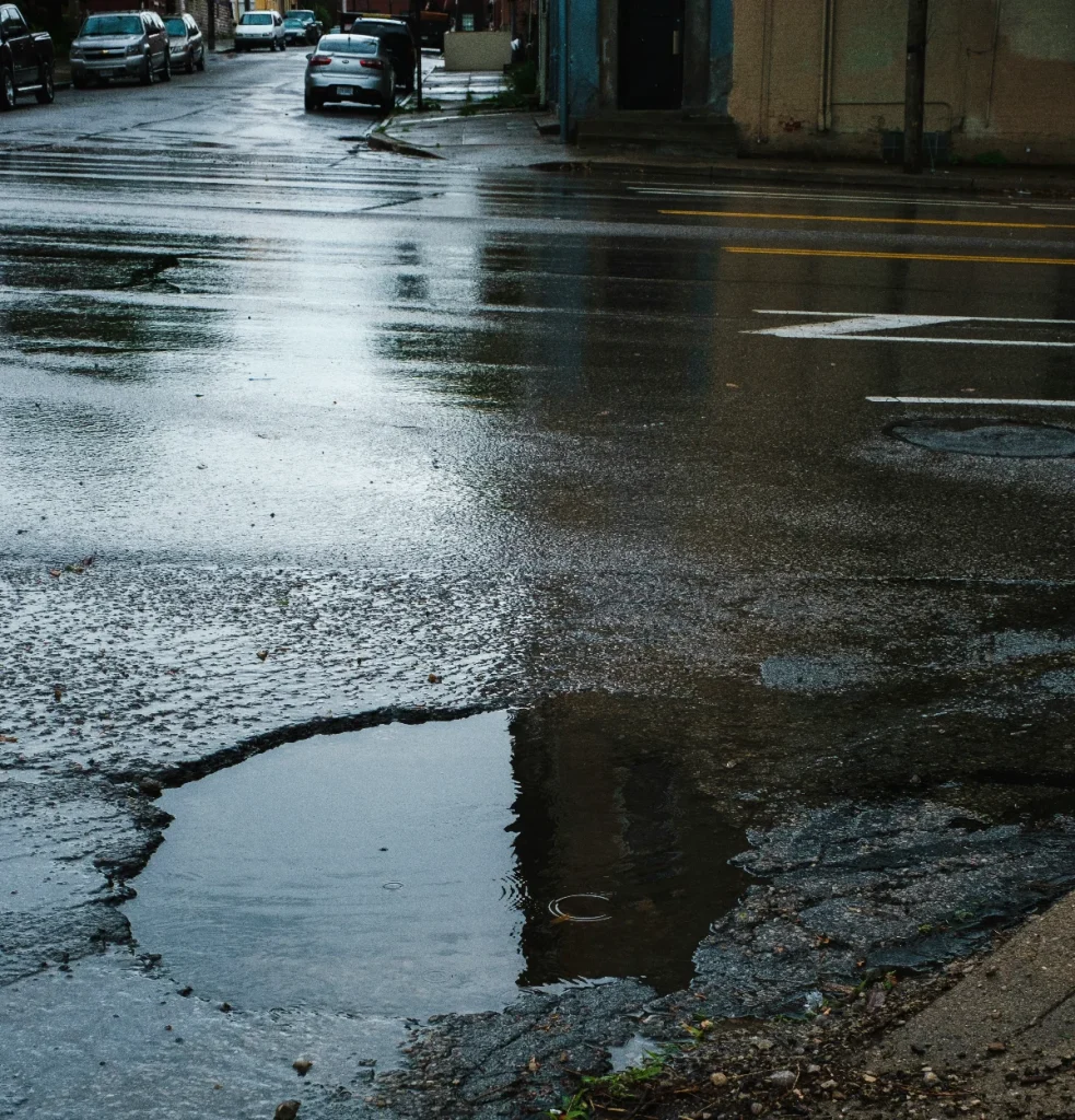 Resourceful 23-year-old mechanic is making $2,200 every night setting up shop next to a single pothole in New York City to repair car tires