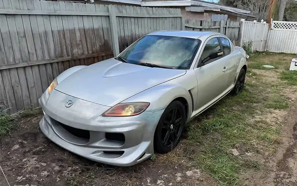 Mazda RX-8 Facebook Marketplace with a triangular steering wheel